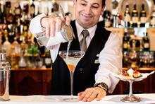 Mr Joaquim Veras, Head Barman preparing cocktails.